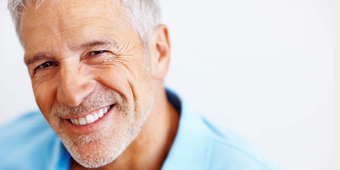 Man Smiling After Dental Work