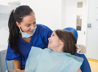 Pediatric Dentist with Kid Patient